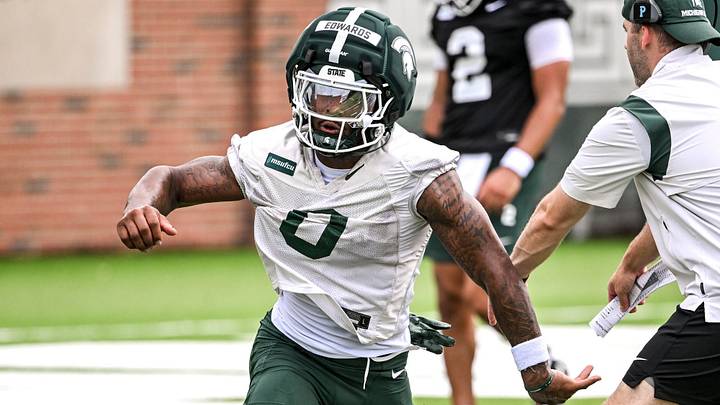Michigan State running back Cam Edwards runs a drill during football practice on Thursday, Aug. 6, 2026, in East Lansing.