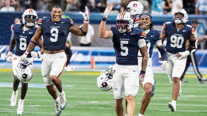 Auburn Tigers safety Eric Winters (5) celebrates his game winning tackle as Auburn Tigers take on Baylor Bears in the Aflac Kickoff Game at Mercedes-Benz Stadium in Atlanta. Auburn Tigers safety Eric Winters (5) celebrates his game winning tackle as Auburn Tigers take on Baylor Bears in the Aflac Kickoff Game at Mercedes-Benz Stadium in Atlanta.