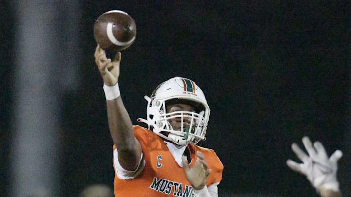 Mandarin's quarterback Tramell Jones (1) throws a pass during third quarter action. The Atlantic Coast Stingrays traveled to Mandarin to play the Mustangs in High School football Friday, September 15, 2023.