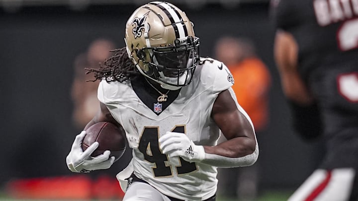 Sep 29, 2024; Atlanta, Georgia, USA; New Orleans Saints running back Alvin Kamara (41) runs against the Atlanta Falcons at Mercedes-Benz Stadium. Mandatory Credit: Dale Zanine-Imagn Images