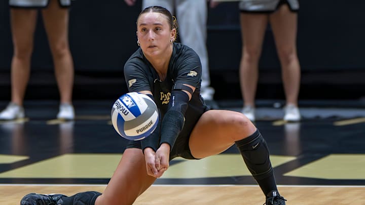 Purdue Sophomore Ryan McAleer digs a ball during a volleyball match against Washington. Purdue Sophomore Ryan McAleer digs a ball during a volleyball match against Washington.