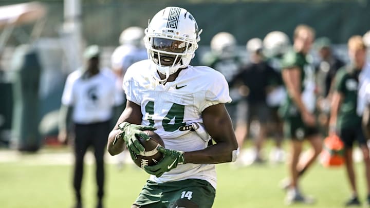 Michigan State's Malcolm Bell catches a ball during football practice on Monday, Aug. 11, 2025, in East Lansing.