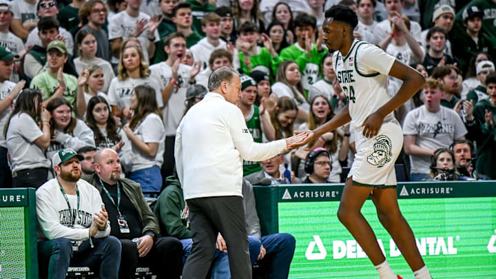 Michigan State's head coach Tom Izzo, left, slaps hands with Xavier Booker after some quality minutes against Penn State during the second half on Wednesday, Jan. 15, 2025, at the Breslin Center in East Lansing.