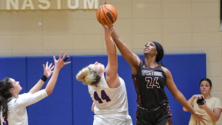 Westside forward Khalia Hartwell (24) blocks a shot by Pickens guard Sadie McKinney (44) during the third quarter at Pickens High on Thursday, February 8, 2024.