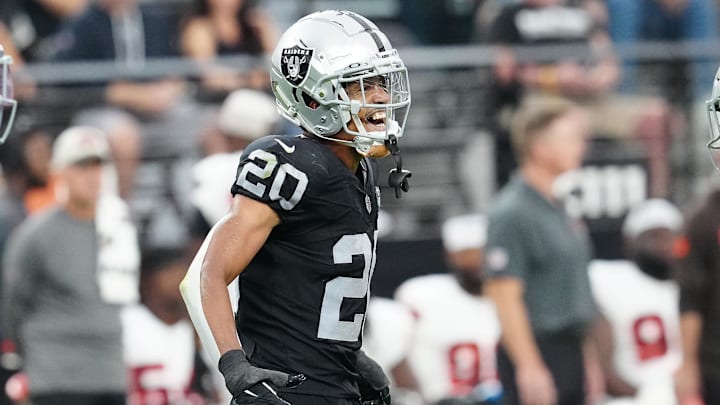 Sep 29, 2024; Paradise, Nevada, USA; Las Vegas Raiders safety Isaiah Pola-Mao (20) celebrates after getting a sack against the Cleveland Browns during the third quarter at Allegiant Stadium. Mandatory Credit: Stephen R. Sylvanie-Imagn Images Sep 29, 2024; Paradise, Nevada, USA; Las Vegas Raiders safety Isaiah Pola-Mao (20) celebrates after getting a sack against the Cleveland Browns during the third quarter at Allegiant Stadium. Mandatory Credit: Stephen R. Sylvanie-Imagn Images