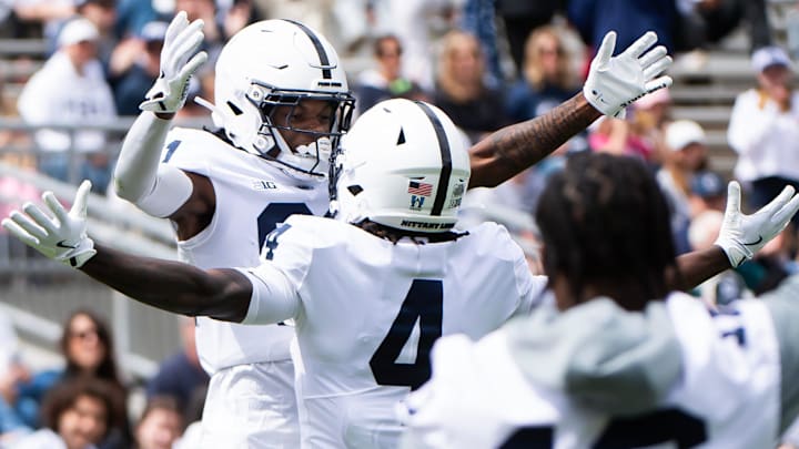 Penn State wide receiver Lyrick Samuel celebrates a touchdown with Tyseer Denmark (4) during the Blue-White Game at Beaver Stadium. Penn State wide receiver Lyrick Samuel celebrates a touchdown with Tyseer Denmark (4) during the Blue-White Game at Beaver Stadium.