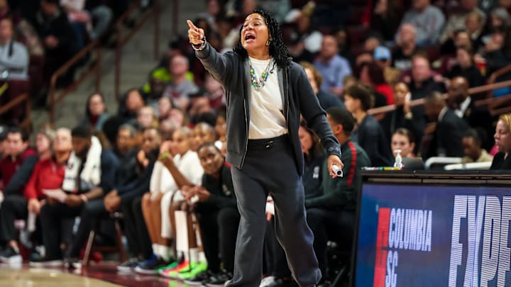 Dec 5, 2024; Columbia, South Carolina, USA; South Carolina Gamecocks head coach Dawn Staley directs her team against the Duke Blue Devils in the first half at Colonial Life Arena. Mandatory Credit: Jeff Blake-Imagn Images