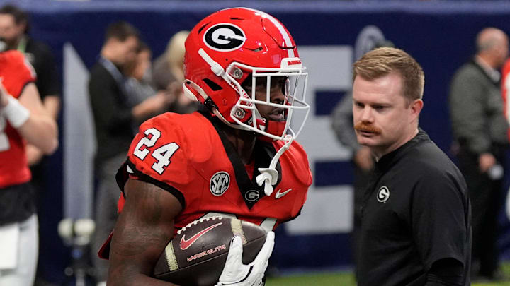 Georgia defensive back Malaki Starks (24) warms up before the start of the SEC championship game against Texas in Atlanta, on Saturday, Dec. 7, 2024. Georgia defensive back Malaki Starks (24) warms up before the start of the SEC championship game against Texas in Atlanta, on Saturday, Dec. 7, 2024.