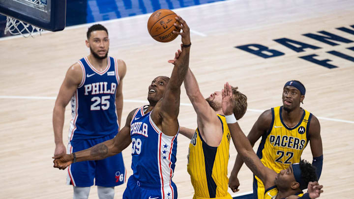 May 11, 2021; Indianapolis, Indiana, USA; Philadelphia 76ers center Dwight Howard (39) rebounds the ball over Indiana Pacers forward Domantas Sabonis (11) in the third quarter at Bankers Life Fieldhouse. Mandatory Credit: Trevor Ruszkowski-Imagn Images