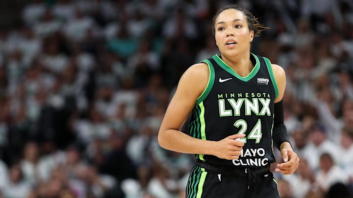 Oct 16, 2024; Minneapolis, Minnesota, USA; Minnesota Lynx forward Napheesa Collier (24) reacts to her basket against the New York Liberty during the first half of game three of the 2024 WNBA Finals at Target Center. Mandatory Credit: Matt Krohn-Imagn Images