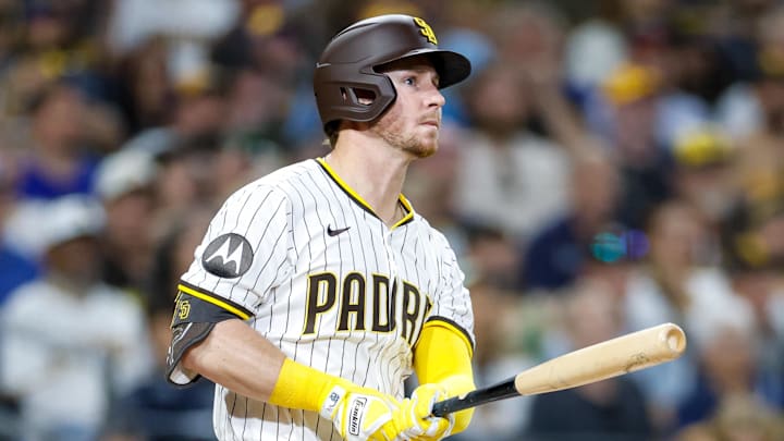 Sep 23, 2025; San Diego, California, USA; San Diego Padres first baseman Ryan O'Hearn (32) hits a grand slam during the first inning against the Milwaukee Brewers at Petco Park. Mandatory Credit: David Frerker-Imagn Images