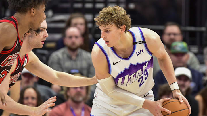 Nov 16, 2025; Salt Lake City, Utah, USA; Utah Jazz forward/center Lauri Markkanen (23) prepares his shot against Chicago Bulls guard Josh Giddey (3) during double overtime at Delta Center. Mandatory Credit: Peter Creveling-Imagn Images