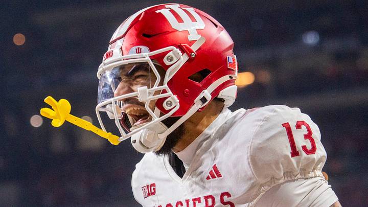 Indiana's Elijah Sarratt (13) celebrates a touchdown catch