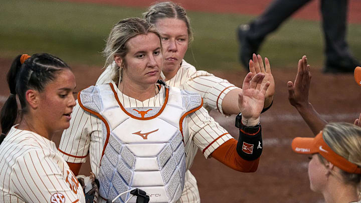 Texas Longhorns catcher Reese Atwood (14) leaves the field at the end of an inning during the game against South Florida on the first day of the Longhorn Invitational on Friday, Feb. 28, 2025 in Austin. Texas Longhorns catcher Reese Atwood (14) leaves the field at the end of an inning during the game against South Florida on the first day of the Longhorn Invitational on Friday, Feb. 28, 2025 in Austin.
