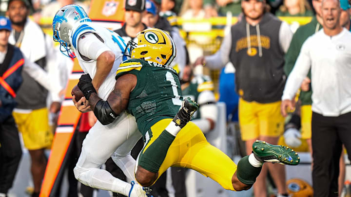 Detroit Lions quarterback Jared Goff (16) is sacked by Green Bay Packers defensive end Micah Parsons (1) during the second half at Lambeau Field in Green Bay, Wis., on Sunday, September 7, 2025.