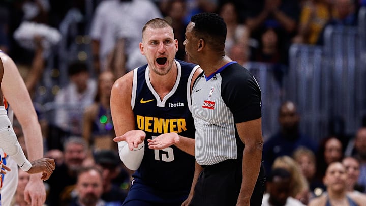 May 11, 2025; Denver, Colorado, USA; Denver Nuggets center Nikola Jokic (15) reacts towards referee Sean Wright (4) after a play in the second quarter against the Oklahoma City Thunder during game four of the second round of the 2025 NBA Playoffs at Ball Arena. Mandatory Credit: Isaiah J. Downing-Imagn Images