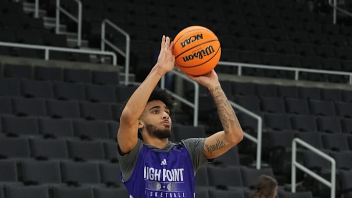 Mar 19, 2025; Providence, RI, USA; High Point Panthers guard Kezza Giffa (1) shoots a the ball during the first round practice session at Amica Mutual Pavilion. Mandatory Credit: Gregory Fisher-Imagn Images