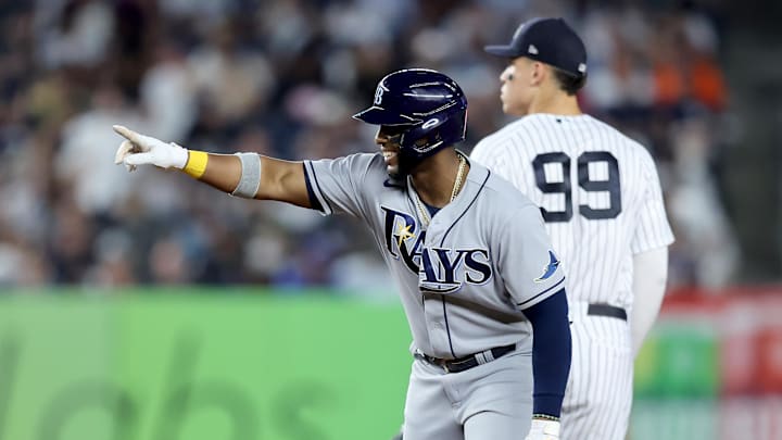 Aug 17, 2022; Bronx, New York, USA; Tampa Bay Rays third baseman Yandy Diaz (2) reacts after hitting a two run double against the New York Yankees during the fifth inning at Yankee Stadium.