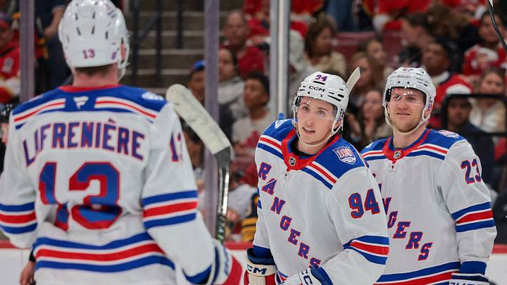 Apr 13, 2026; Sunrise, Florida, USA; New York Rangers right wing Gabe Perreault (94) celebrates with left wing Alexis Lafreniere (13) after scoring against the Florida Panthers during the second period at Amerant Bank Arena. Mandatory Credit: Sam Navarro-Imagn Images