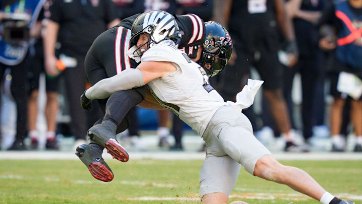Oregon defensive back Dillon Thieneman brings down Texas Tech quarterback Behren Morton in the Orange Bowl Oregon defensive back Dillon Thieneman brings down Texas Tech quarterback Behren Morton in the Orange Bowl