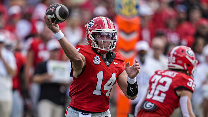Aug 30, 2025; Athens, Georgia, USA; Georgia Bulldogs quarterback Gunner Stockton (14) passes the ball against the Marshall Thundering Herd during the first quarter at Sanford Stadium. Mandatory Credit: Dale Zanine-Imagn Images Aug 30, 2025; Athens, Georgia, USA; Georgia Bulldogs quarterback Gunner Stockton (14) passes the ball against the Marshall Thundering Herd during the first quarter at Sanford Stadium. Mandatory Credit: Dale Zanine-Imagn Images