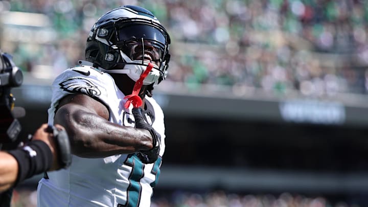 Sep 21, 2025; Philadelphia, Pennsylvania, USA; Philadelphia Eagles wide receiver AJ. Brown (11) reacts after scoring a touchdown against the Los Angeles Rams during the first half at Lincoln Financial Field. Mandatory Credit: Bill Streicher-Imagn Images