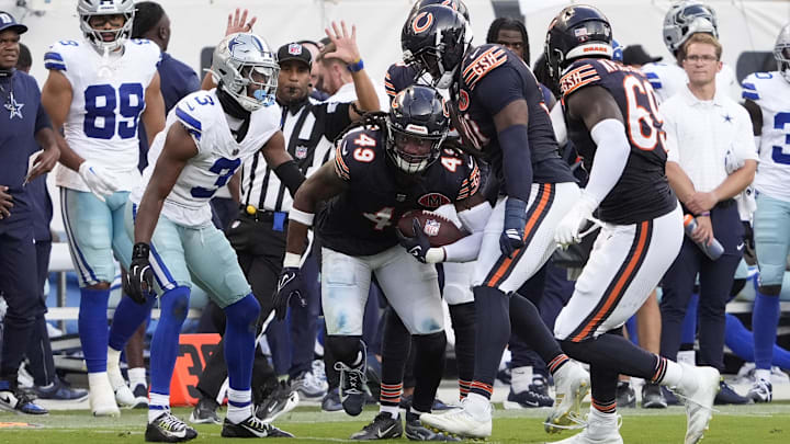 Bears middle linebacker Tremaine Edmunds intercepts a pass in front of Dallas Cowboys wide receiver George Pickens in the fourth quarter.