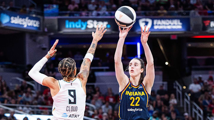 Jun 14, 2025; Indianapolis, Indiana, USA; Indiana Fever guard Caitlin Clark (22) shoots the ball while New York Liberty guard Natasha Cloud (9) defends in the first half at Gainbridge Fieldhouse. Mandatory Credit: Trevor Ruszkowski-Imagn Images Jun 14, 2025; Indianapolis, Indiana, USA; Indiana Fever guard Caitlin Clark (22) shoots the ball while New York Liberty guard Natasha Cloud (9) defends in the first half at Gainbridge Fieldhouse. Mandatory Credit: Trevor Ruszkowski-Imagn Images