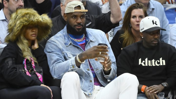 May 13, 2024; Cleveland, Ohio, USA; Savannah James, LeBron James and Rich Paul sit in the front in the fourth quarter of game four of the second round for the 2024 NBA playoffs between the Cleveland Cavaliers and the Boston Celtics at Rocket Mortgage FieldHouse. May 13, 2024; Cleveland, Ohio, USA; Savannah James, LeBron James and Rich Paul sit in the front in the fourth quarter of game four of the second round for the 2024 NBA playoffs between the Cleveland Cavaliers and the Boston Celtics at Rocket Mortgage FieldHouse.