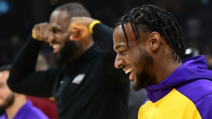 Oct 30, 2024; Cleveland, Ohio, USA; Los Angeles Lakers guard Bronny James, right, and forward LeBron James warm up before the game between the Cleveland Cavaliers and the Lakers at Rocket Mortgage FieldHouse. Mandatory Credit: Ken Blaze-Imagn Images Oct 30, 2024; Cleveland, Ohio, USA; Los Angeles Lakers guard Bronny James, right, and forward LeBron James warm up before the game between the Cleveland Cavaliers and the Lakers at Rocket Mortgage FieldHouse. Mandatory Credit: Ken Blaze-Imagn Images