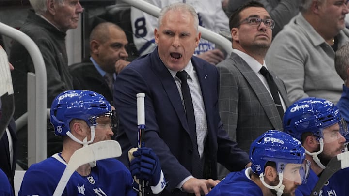 Dec 8, 2025; Toronto, Ontario, CAN; Toronto Maple Leafs head coach Craig Berube talks to his players during the third period against the Tampa Bay Lightning at Scotiabank Arena. Mandatory Credit: John E. Sokolowski-Imagn Images