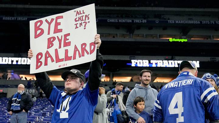 Noah Stamm, of Fort Wayne, holds up a sign signaling for the Indianapolis Colts to get rid of general manager Chris Ballard Sunday, Jan. 8, 2023, after losing a game 32-31 to the Houston Texans at Lucas Oil Stadium in Indianapolis.