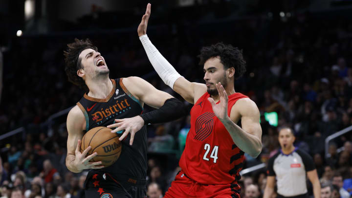 Apr 5, 2024; Washington, District of Columbia, USA; Washington Wizards forward Deni Avdija (8) drives to the basket as Portland Trail Blazers forward Justin Minaya (24) defends in the second half at Capital One Arena. Mandatory Credit: Geoff Burke-USA TODAY Sports Apr 5, 2024; Washington, District of Columbia, USA; Washington Wizards forward Deni Avdija (8) drives to the basket as Portland Trail Blazers forward Justin Minaya (24) defends in the second half at Capital One Arena. Mandatory Credit: Geoff Burke-USA TODAY Sports