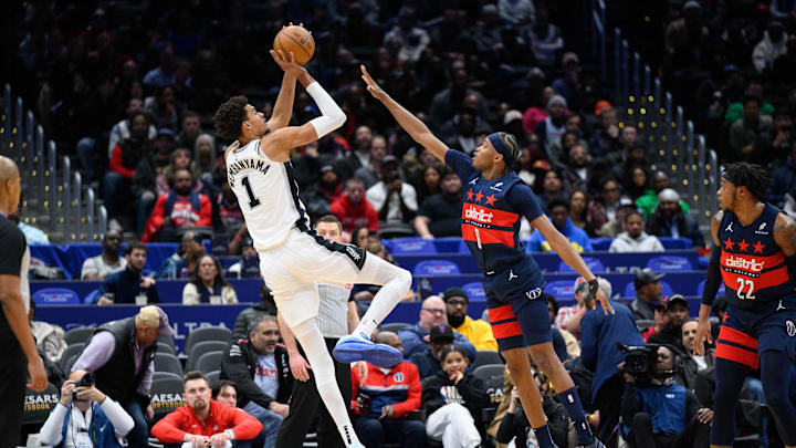 Feb 10, 2025; Washington, District of Columbia, USA; San Antonio Spurs center Victor Wembanyama (1) takes a shot over Washington Wizards guard Bilal Coulibaly (0) during the first quarter at Capital One Arena. Mandatory Credit: Reggie Hildred-Imagn Images