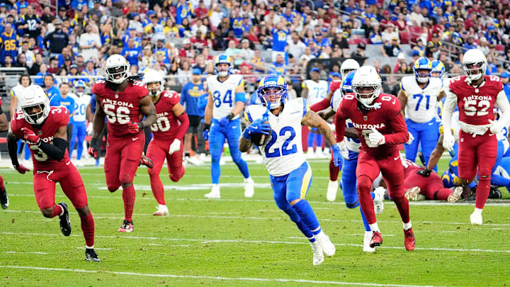 Los Angeles Rams running back Blake Corum (22) runs for a touchdown against the Arizona Cardinals in the second half at State Farm Stadium on Dec 7, 2025, in Glendale, Ariz. Los Angeles Rams running back Blake Corum (22) runs for a touchdown against the Arizona Cardinals in the second half at State Farm Stadium on Dec 7, 2025, in Glendale, Ariz.