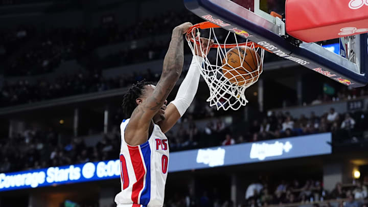 Dec 28, 2024; Denver, Colorado, USA; Detroit Pistons forward Ronald Holland II (00) dunks the ball in the second half against the Denver Nuggets at Ball Arena. Mandatory Credit: Ron Chenoy-Imagn Images