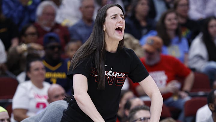 Jun 7, 2025; Chicago, Illinois, USA; Indiana Fever guard Caitlin Clark (22)reacts to a basket scored by a teammate against the Chicago Sky during the first half of a WNBA game at United Center. Mandatory Credit: Kamil Krzaczynski-Imagn Images
