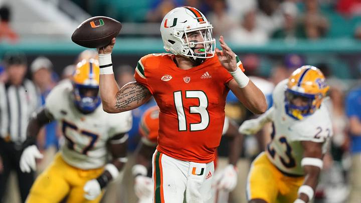 Nov 26, 2022; Miami Gardens, Florida, USA; Miami Hurricanes quarterback Jake Garcia (13) attempts a pass against the Pittsburgh Panthers during the first half at Hard Rock Stadium. Mandatory Credit: Jasen Vinlove-USA TODAY Sports