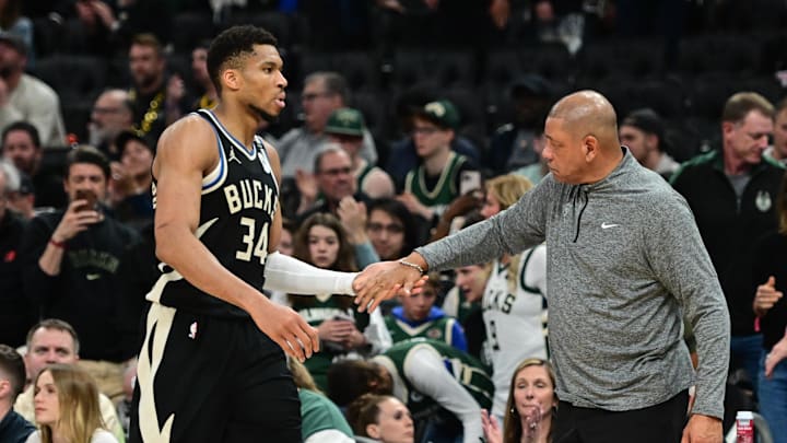 Apr 27, 2025; Milwaukee, Wisconsin, USA; Milwaukee Bucks forward Giannis Antetokounmpo (34) exits the game in the fourth quarter as head coach Doc Rivers shakes his hand during game four against the Indiana Pacers of first round for the 2024 NBA Playoffs at Fiserv Forum. Mandatory Credit: Benny Sieu-Imagn Images