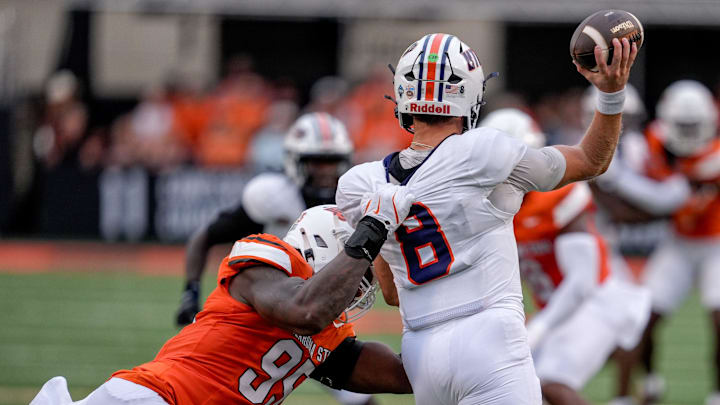 New defensive coordinator Todd Grantham's defense erupted for for sacks and an interception in  Oklahoma State's  27-7 win over UT Martin.  