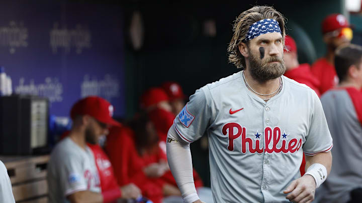 Sep 28, 2024; Washington, District of Columbia, USA; Philadelphia Phillies first base Bryce Harper (3) stands in the dugout prior to the game against the Washington Nationals at Nationals Park. 
