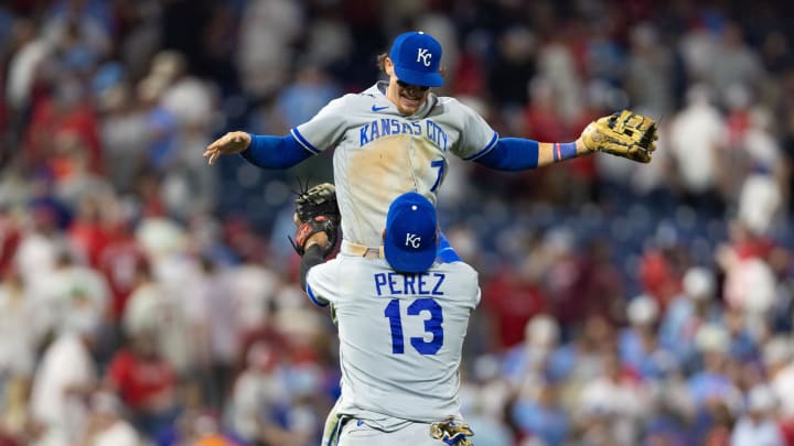 Aug 4, 2023; Philadelphia, Pennsylvania, USA; Kansas City Royals catcher Salvador Perez (13) lifts shortstop Bobby Witt Jr. (7) as they celebrate a victory against the Philadelphia Phillies at Citizens Bank Park. Mandatory Credit: Bill Streicher-USA TODAY Sports