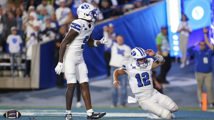 Darius Lassiter and Jake Retzlaff celebrate in the endzone against Kansas State.