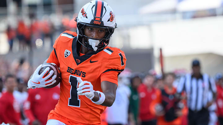 Sep 6, 2025; Corvallis, Oregon, USA; Oregon State Beavers wide receiver David Wells Jr. (1) scores a touchdown after a catch during the second half against the Fresno State Bulldogs at Reser Stadium. Mandatory Credit: Craig Strobeck-Imagn Images
