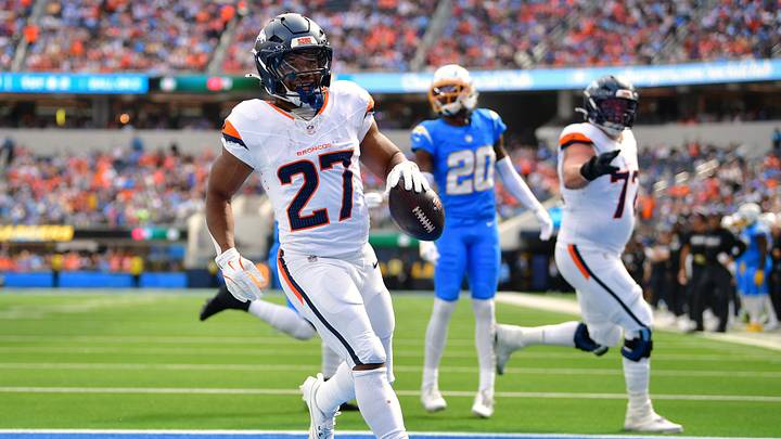 Oct 11, 2026; Inglewood, California, USA; Denver Broncos running back J.K. Dobbins (27) runs for a touchdown against the Los Angeles Chargers during the first half at SoFi Stadium. Oct 11, 2026; Inglewood, California, USA; Denver Broncos running back J.K. Dobbins (27) runs for a touchdown against the Los Angeles Chargers during the first half at SoFi Stadium.