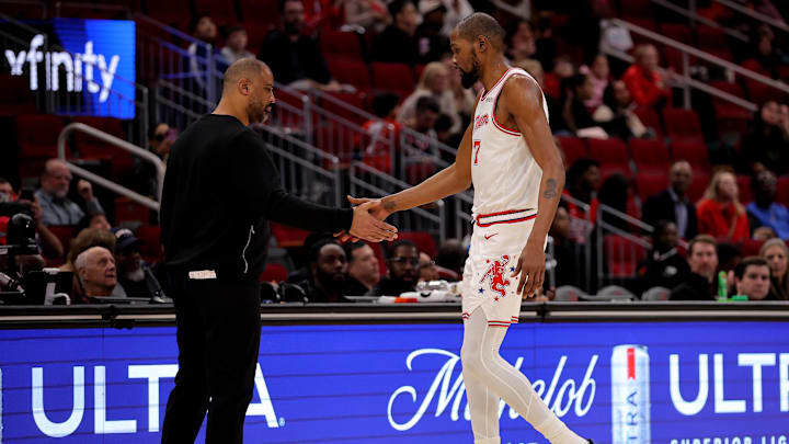 Jan 18, 2026; Houston, Texas, USA; Houston Rockets forward Kevin Durant (7) shakes hands with head coach Ime Udoka after leaving the game against the New Orleans Pelicans during the fourth quarter at Toyota Center. Mandatory Credit: Erik Williams-Imagn Images
