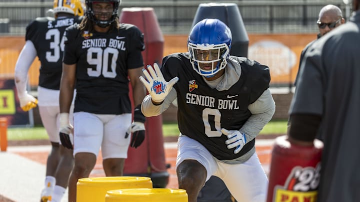 Jan 29, 2025; Mobile, AL, USA; American team defensive lineman Deone Walker of Kentucky (0) works in a drill during Senior Bowl practice for the National team at Hancock Whitney Stadium. Mandatory Credit: Vasha Hunt-Imagn Images