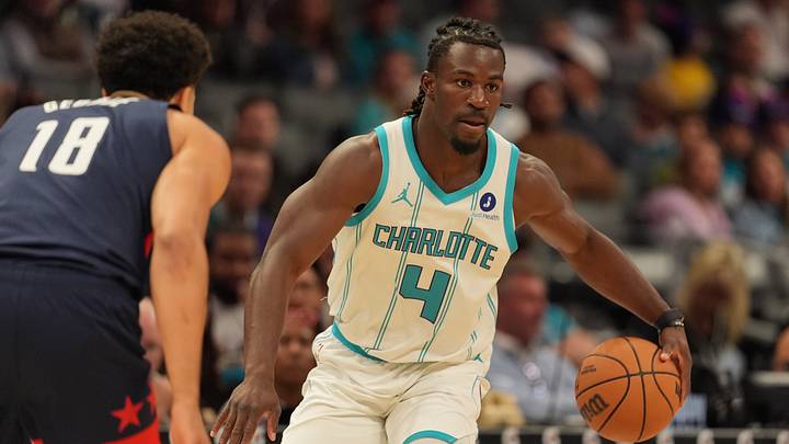 Oct 26, 2026; Charlotte, North Carolina, USA; Charlotte Hornets guard Sion James (4) handles the ball against Washington Wizards forward Kyshawn George (18) during the first half at the Spectrum Center. Mandatory Credit: Jim Dedmon-Imagn Images Oct 26, 2026; Charlotte, North Carolina, USA; Charlotte Hornets guard Sion James (4) handles the ball against Washington Wizards forward Kyshawn George (18) during the first half at the Spectrum Center. Mandatory Credit: Jim Dedmon-Imagn Images