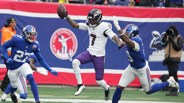 Dec 15, 2024; East Rutherford, New Jersey, USA; Baltimore Ravens wide receiver Rashod Bateman (7) scores a touchdown against the New York Giants in the first half at MetLife Stadium. Mandatory Credit: Robert Deutsch-Imagn Images