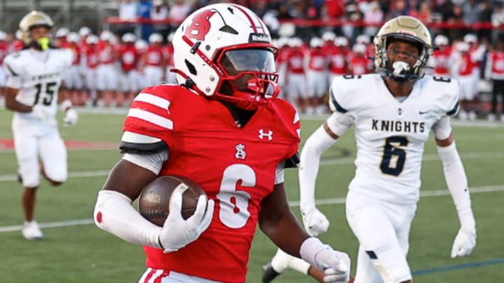 Second ranked Archbishop Spalding bounced back from its opening week loss in Indiana to trounce Ohio power Archbishop Hoban in its home opener.